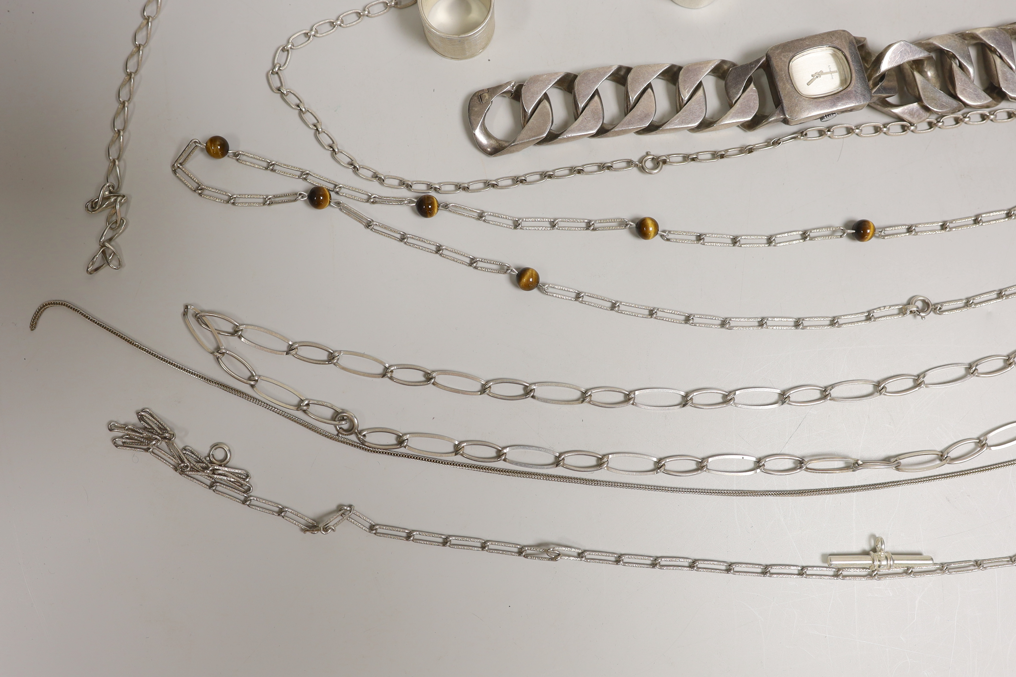 Sundry silver and white metal jewellery etc. including T-bars, necklaces, rings and a large curb link bracelet watch.